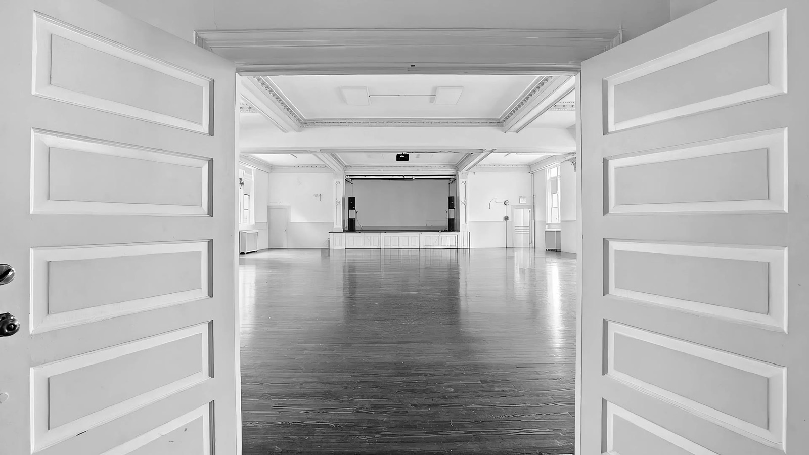 Double doors opening onto the auditorium